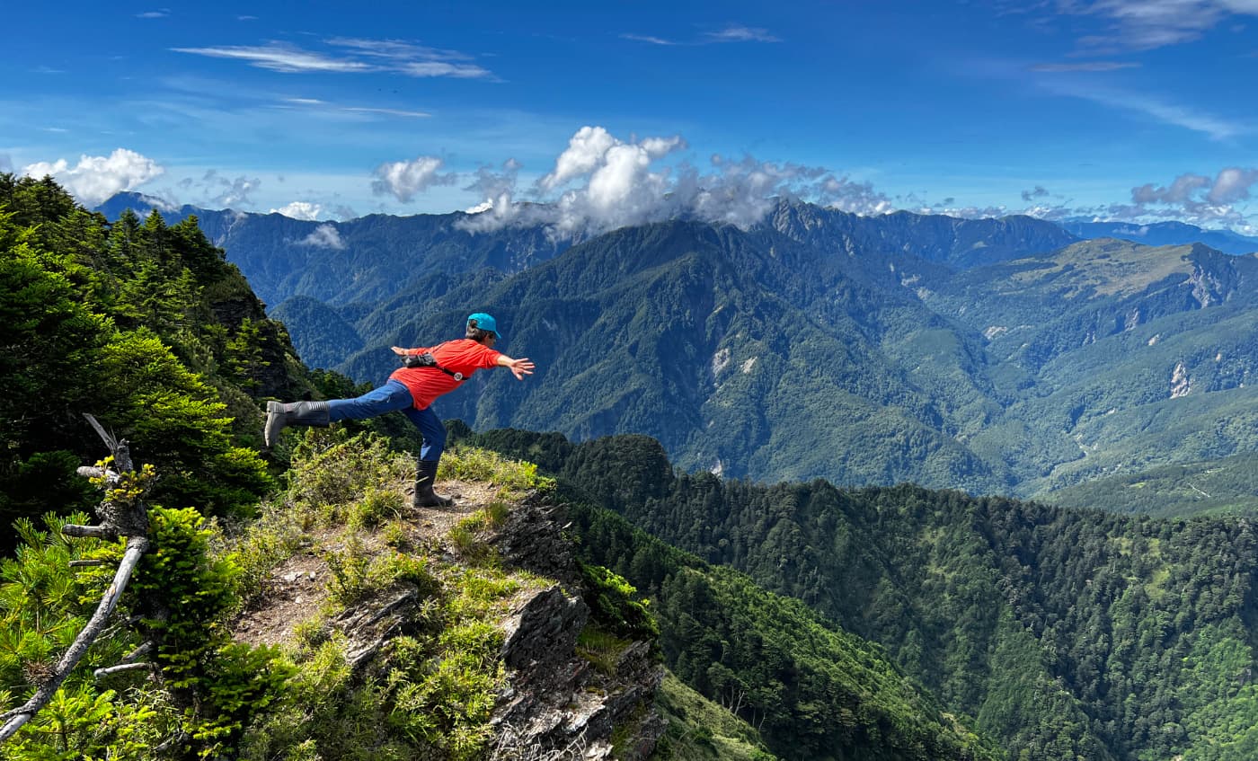 Hiker posing at a high mountain in Taiwan 